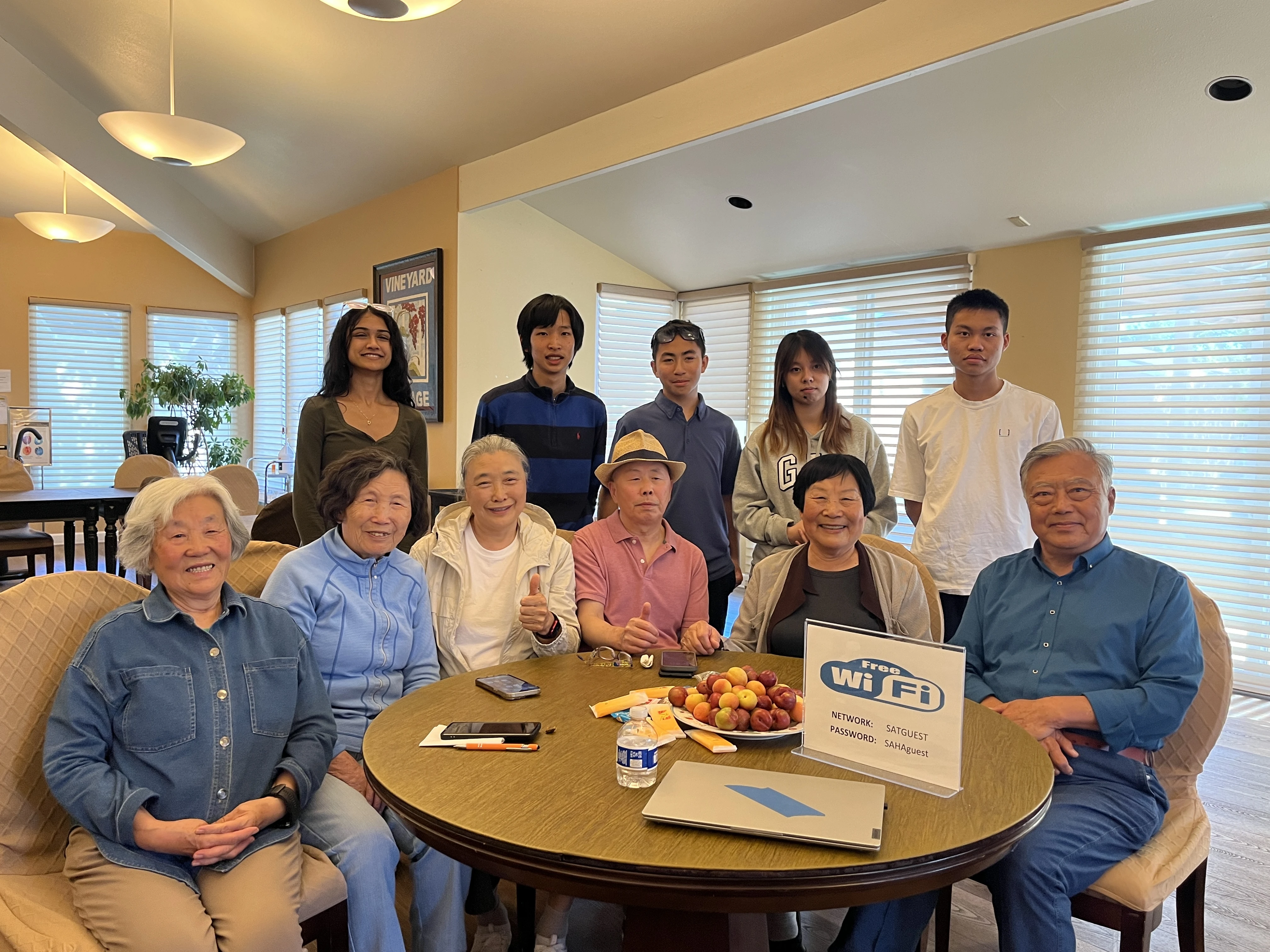Senior residents and AI Bridge student volunteers participate in a hands-on technology workshop at Vineyard Village in Livermore. Photo courtesy of AI Bridge.